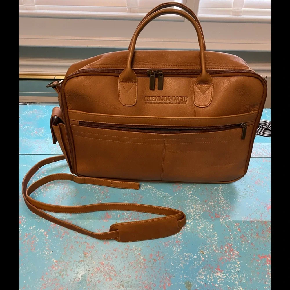 Leather briefcase 17” x 12” x 2.5” with 51” shoulder strap